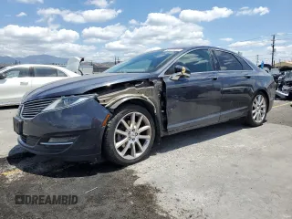 2014 Lincoln MKZ with VIN 3LN6L2GK2ER833824, listed as a Copart auction lot 56428675 with 128,475 mi miles and Salvage title. Bid and sale history available at DreamBid. Image 1.