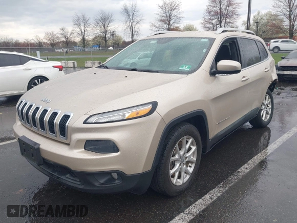 2014 Jeep Cherokee Latitude with VIN 1C4PJLCB8EW191911, listed as a IAAI auction lot 41956728 with 123,643 mi miles. Bid and sale history available at carsss.com. Image 17.