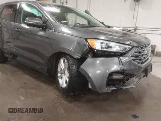 2019 Ford Edge SEL z VIN 2FMPK3J92KBC32443, wystawiony jako IAAI lot #41221732 z przebiegiem 32 307 mil mil oraz . Historia ofert i sprzedaży dostępna na DreamBid. Obrazek 19.