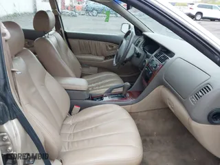 2000 Mitsubishi Diamante LS with VIN 6MMAP67P7YT005234, listed as a IAAI auction lot 41896098 with 131,852 mi miles. Bid and sale history available at carsss.com. Image 5.