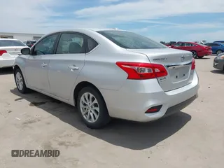 2019 Nissan Sentra SV z VIN 3N1AB7AP1KL604264, wystawiony jako IAAI lot #42304142 z przebiegiem 87 506 mil mil oraz . Historia ofert i sprzedaży dostępna na DreamBid. Obrazek 3.