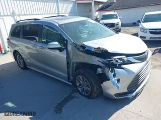 2021 Toyota Sienna LE with VIN 5TDBRKEC2MS021058, listed as a IAAI auction lot 41863947 with 73,608 mi miles. Bid and sale history available at carsss.com. Image 1.
