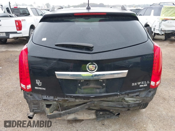 2016 Cadillac SRX Luxury Collection z VIN 3GYFNBE32GS577023, wystawiony jako IAAI lot #42374130 z przebiegiem 132 671 mil mil oraz . Historia ofert i sprzedaży dostępna na DreamBid. Obrazek 16.