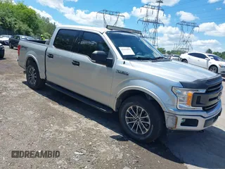 2019 Ford F-150 XL with VIN 1FTEW1EP1KFD51936, listed as a IAAI auction lot 42216092 with 58,699 mi miles and . Bid and sale history available at DreamBid. Image 1.