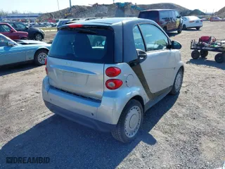 2015 Smart fortwo Passion with VIN WMEEJ3BA6FK793068, listed as a IAAI auction lot 42007847 with 42,313 mi miles. Bid and sale history available at carsss.com. Image 4.