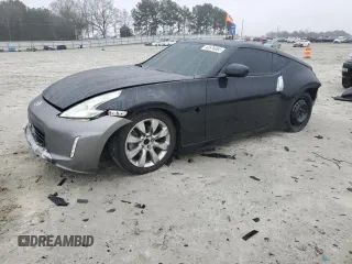 2009 Nissan 370Z Touring with VIN JN1AZ44E19M406904, listed as a Copart auction lot 43576065 with 0 mi miles and Salvage Title. Bid and sale history available at carsss.com. Image 1.