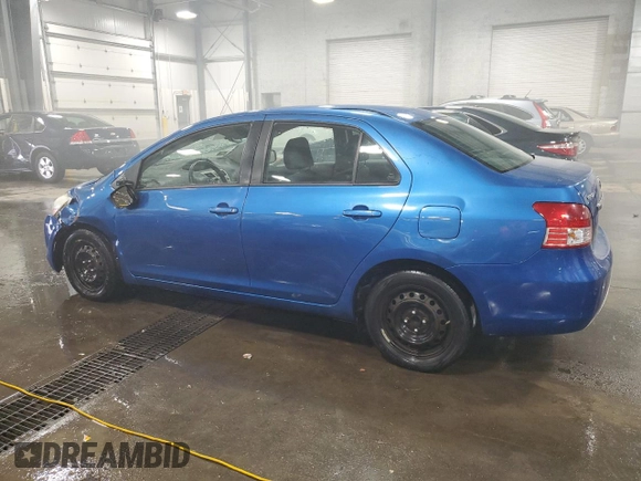 2009 Toyota Yaris with VIN JTDBT903991315725, listed as a Copart auction lot 52566735 with 177,044 mi miles and Salvage Title. Bid and sale history available at DreamBid. Image 2.