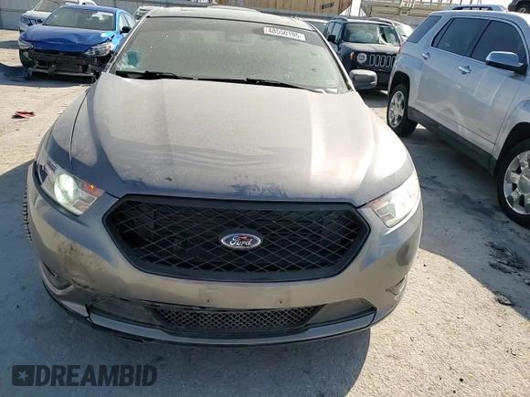2014 Ford Taurus Limited z VIN 1FAHP2F88EG134315, wystawiony jako Copart lot #48550195 z przebiegiem 136 275 mil mil oraz Szkoda całkowita • Salvage title. Historia ofert i sprzedaży dostępna na DreamBid. Obrazek 10.
