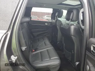 2017 Jeep Grand Cherokee Summit with VIN 1C4RJFJT1HC818136, listed as a Copart auction lot 81057084 with 135,843 mi miles and Salvage title. Bid and sale history available at DreamBid. Image 11.