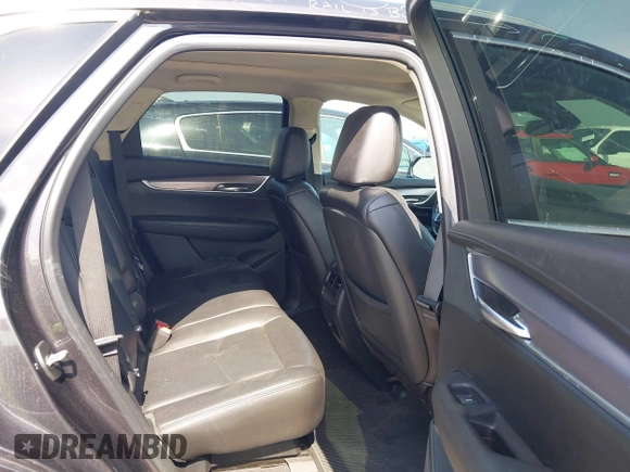 2018 Cadillac XT5 Luxury AWD z VIN 1GYKNDRS0JZ209266, wystawiony jako IAAI lot #42454536 z przebiegiem 52 839 mil mil oraz . Historia ofert i sprzedaży dostępna na DreamBid. Obrazek 8.