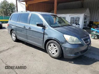 2006 Honda Odyssey EX-L with VIN 5FNRL38706B030501, listed as a Copart auction lot 53096515 with 197,215 mi miles and Salvage Title. Bid and sale history available at carsss.com. Image 4.