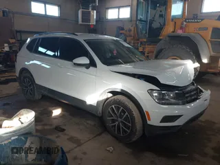 2021 Volkswagen Tiguan S with VIN 3VV0B7AX9MM037227, listed as a IAAI auction lot 41646442 with 47,515 mi miles. Bid and sale history available at carsss.com. Image 1.