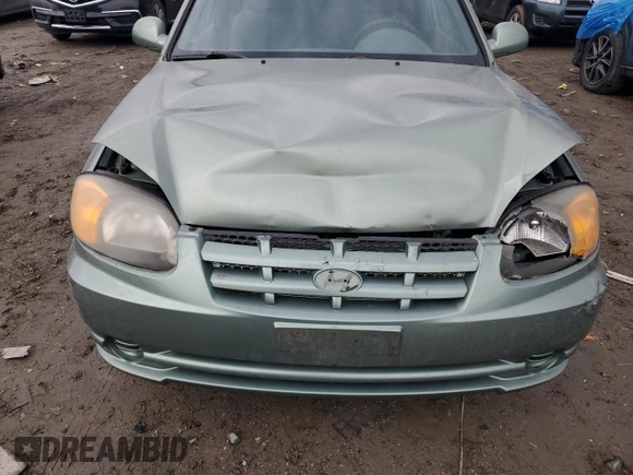 2003 Hyundai Accent GL with VIN KMHCG35C43U236043, listed as a Copart auction lot 87675835 with 76,232 mi miles and Salvage Title. Bid and sale history available at carsss.com. Image 11.