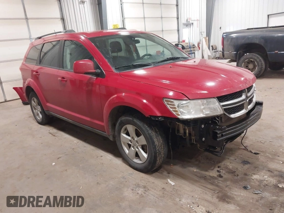 2012 Dodge Journey SXT z VIN 3C4PDDBG4CT397806, wystawiony jako IAAI lot #41333394 z przebiegiem 122 804 mil mil oraz . Historia ofert i sprzedaży dostępna na DreamBid. Obrazek 1.