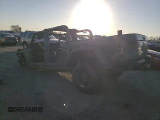 2021 Jeep Gladiator Rubicon z VIN 1C6JJTBMXML503128, wystawiony jako Copart lot #42813725 z przebiegiem Nie podano mil oraz Szkoda całkowita • Salvage title. Historia ofert i sprzedaży dostępna na DreamBid. Obrazek 2.