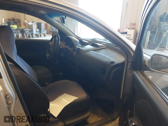 2006 Chevrolet Aveo LS with VIN KL1TD66616B565264, listed as a IAAI auction lot 42120710 with 150,638 mi miles and . Bid and sale history available at DreamBid. Image 5.