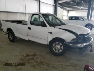 2000 Ford F-150 XL с VIN 1FTPF17L1YKA92061, выставлен на аукционе Copart как лот 66962304 с пробегом Не указан миль и Списание • Salvage title. История ставок и продаж доступна на DreamBid. Изображение 4.
