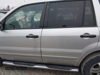 2005 Honda Pilot EX-L with RES with VIN 5FNYF186X5B062577, listed as a IAAI auction lot 42018093 with 209,321 mi miles. Bid and sale history available at carsss.com. Image 14.