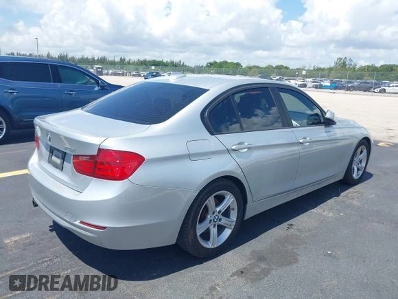 2013 BMW 3 Series 328i with VIN WBA3C1G50DNN93277, listed as a IAAI auction lot 42448381 with 83,758 mi miles and . Bid and sale history available at DreamBid. Image 4.