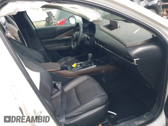 2021 Mazda CX-30 Premium with VIN 3MVDMBDM8MM216520, listed as a IAAI auction lot 41848596 with 60,353 mi miles and . Bid and sale history available at DreamBid. Image 5.