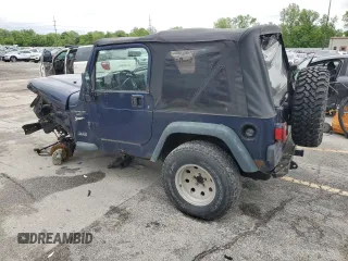 1997 Jeep Wrangler Sport z VIN 1J4FY19S9VP490590, wystawiony jako Copart lot #57492775 z przebiegiem 161 648 mil mil oraz Szkoda całkowita • Salvage title. Historia ofert i sprzedaży dostępna na DreamBid. Obrazek 2.