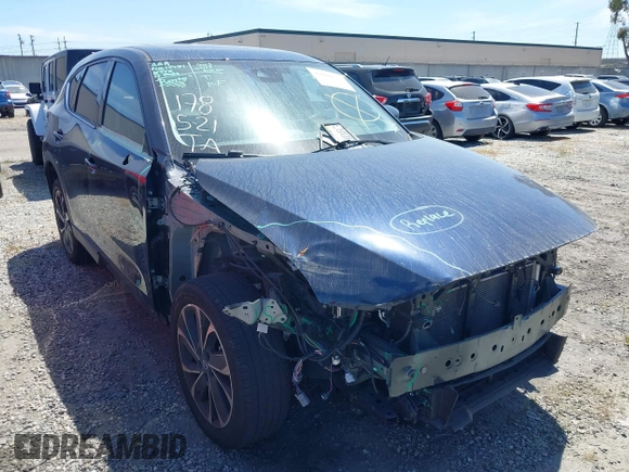 2023 Mazda CX-5 S Premium with VIN JM3KFBDM4P0185865, listed as a IAAI auction lot 42040234 with 32,761 mi miles and . Bid and sale history available at DreamBid. Image 1.