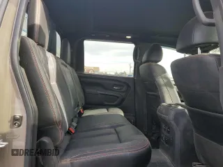 2024 Nissan Titan Pro-4X with VIN 1N6AA1ED3RN103011, listed as a Copart auction lot 87050954 with 8,829 mi miles and Salvage title. Bid and sale history available at DreamBid. Image 11.