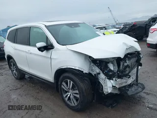 2017 Honda Pilot EX-L z VIN 5FNYF6H64HB084561, wystawiony jako IAAI lot #41158978 z przebiegiem 75 820 mil mil oraz . Historia ofert i sprzedaży dostępna na DreamBid. Obrazek 1.