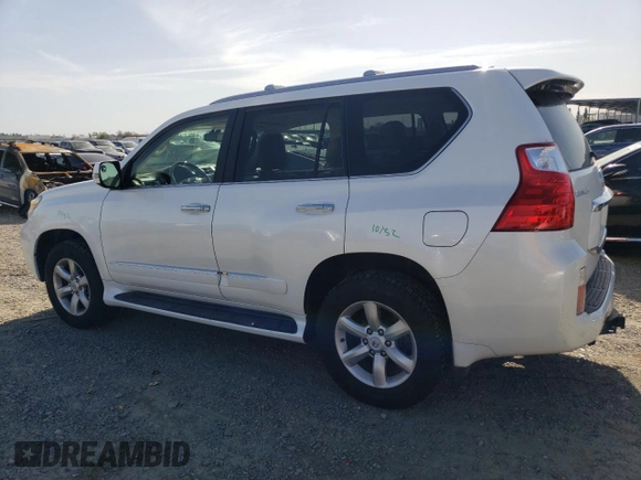 2010 Lexus GX 460 Premium with VIN JTJJM7FX6A5001418, listed as a Copart auction lot 52404285 with 169,065 mi miles and Salvage title. Bid and sale history available at DreamBid. Image 2.