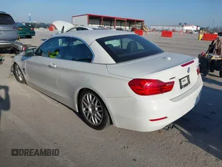 2015 BMW 4 Series 428i xDrive with VIN WBA3T1C51FP821140, listed as a IAAI auction lot 41802697 with 95,232 mi miles and . Bid and sale history available at carsss.com. Image 3.