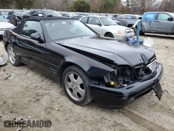 1999 Mercedes-Benz SL-Class with VIN WDBFA68F0XF184008, listed as a Copart auction lot 84998014 with 74,809 mi miles and Salvage Title. Bid and sale history available at carsss.com. Image 4.