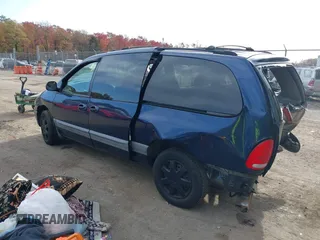 2000 Dodge Caravan SE z VIN 1B4GP44GXYB759910, wystawiony jako IAAI lot #40764911 z przebiegiem 167 315 mil mil oraz . Historia ofert i sprzedaży dostępna na DreamBid. Obrazek 3.