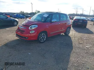 2014 FIAT 500L Lounge with VIN ZFBCFACH7EZ005169, listed as a IAAI auction lot 41250084 with 132,605 mi miles and . Bid and sale history available at DreamBid. Image 2.