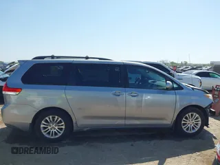 2011 Toyota Sienna XLE AAS with VIN 5TDYK3DC2BS048831, listed as a IAAI auction lot 42002556 with 231,906 mi miles and . Bid and sale history available at DreamBid. Image 14.