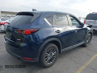 2019 Mazda CX-5 Touring with VIN JM3KFACM5K0697137, listed as a IAAI auction lot 41720253 with 50,416 mi miles. Bid and sale history available at carsss.com. Image 4.