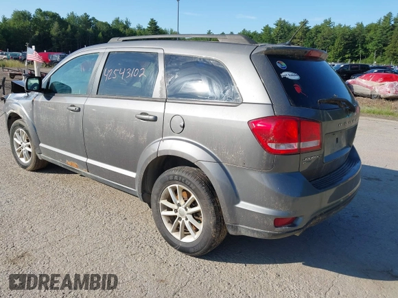 2013 Dodge Journey SXT with VIN 3C4PDDBGXDT607052, listed as a IAAI auction lot 42543102 with 157,325 mi miles and . Bid and sale history available at DreamBid. Image 3.