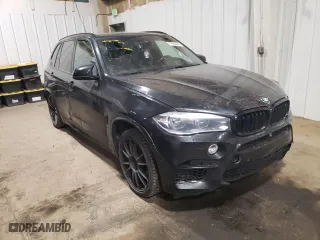 2015 BMW X5 M with VIN 5YMKT6C58F0C89657, listed as a Copart auction lot 77462264 with 110,706 mi miles and Clean Title. Bid and sale history available at carsss.com. Image 4.