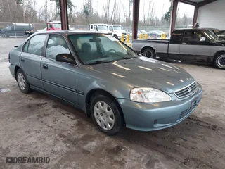 2000 Honda Civic LX with VIN 2HGEJ657XYH603719, listed as a IAAI auction lot 41215172 with 209,704 mi miles. Bid and sale history available at carsss.com. Image 1.