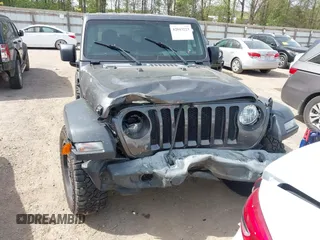 2019 Jeep Wrangler Unlimited Sport S with VIN 1C4HJXDG2KW516571, listed as a IAAI auction lot 42043223 with 58,131 mi miles and . Bid and sale history available at DreamBid. Image 6.