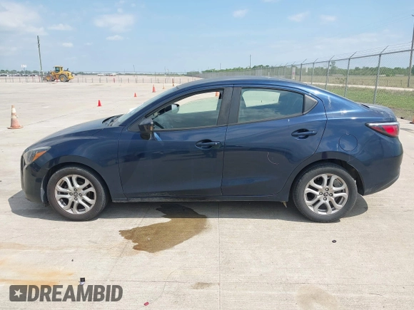 2018 Toyota Yaris with VIN 3MYDLBYV7JY305900, listed as a IAAI auction lot 42052167 with 128,876 mi miles and . Bid and sale history available at DreamBid. Image 14.