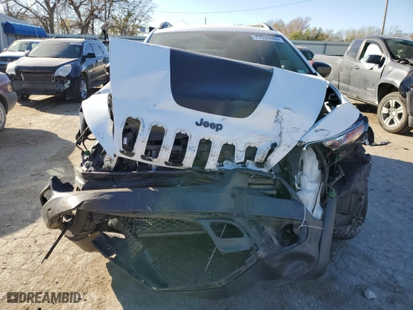 2018 Jeep Cherokee Trailhawk with VIN 1C4PJMBB1JD549783, listed as a Copart auction lot 77056883 with 84,404 mi miles and Non Repairable. Bid and sale history available at carsss.com. Image 5.