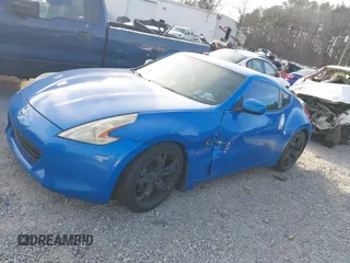 2009 Nissan 370Z Touring with VIN JN1AZ44E39M400201, listed as a IAAI auction lot 41710283 with 245,735 mi miles and . Bid and sale history available at DreamBid. Image 14.