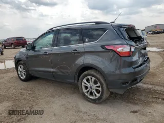 2018 Ford Escape SE with VIN 1FMCU0G90JUB62738, listed as a Copart auction lot 63380654 with 157,762 mi miles and Salvage Title. Bid and sale history available at carsss.com. Image 2.