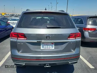 2023 Volkswagen Atlas SE z VIN 1V2HR2CA5PC526012, wystawiony jako IAAI lot #42796408 z przebiegiem 41 216 mil mil oraz . Historia ofert i sprzedaży dostępna na DreamBid. Obrazek 27.