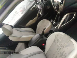 2012 Hyundai Veloster w/Gray Int with VIN KMHTC6AD2CU024382, listed as a IAAI auction lot 41980192 with 46,684 mi miles and . Bid and sale history available at DreamBid. Image 5.