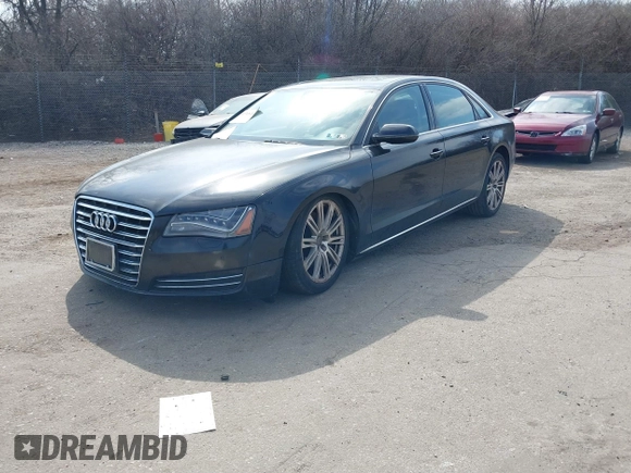 2012 Audi A8 L with VIN WAURVAFD7CN004673, listed as a IAAI auction lot 41768222 with 108,982 mi miles. Bid and sale history available at carsss.com. Image 2.