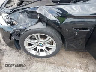 2013 BMW 5 Series 528i with VIN WBAXG5C51DDY33333, listed as a IAAI auction lot 41685179 with 94,936 mi miles and . Bid and sale history available at carsss.com. Image 6.
