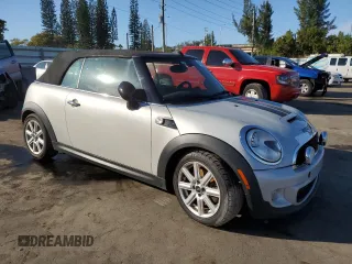 2013 MINI Convertible S with VIN WMWZP3C50DT550800, listed as a Copart auction lot 42409015 with 101,421 mi miles and Salvage title. Bid and sale history available at DreamBid. Image 4.