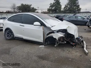 2023 Tesla Model X with VIN 7SAXCAE54PF377056, listed as a Copart auction lot 44925145 with 0 mi miles and Salvage Title. Bid and sale history available at carsss.com. Image 4.