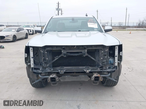 2018 Chevrolet Silverado 1500 LT with VIN 1GCRCREH8JZ172209, listed as a IAAI auction lot 41569533 with 144,475 mi miles and . Bid and sale history available at DreamBid. Image 6.